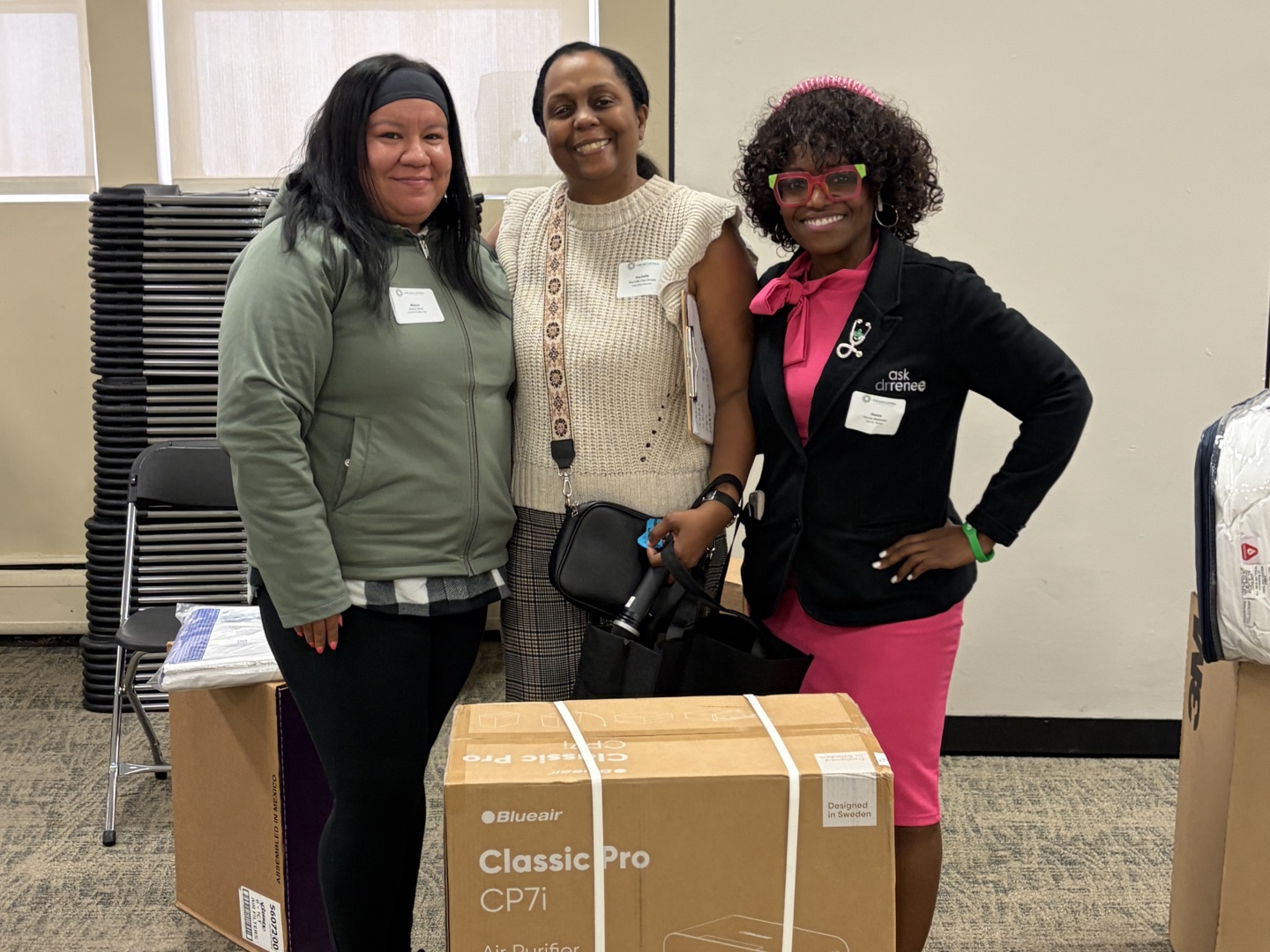 Rachelle Paul-Brutus, Executive Director of the Chicago Asthma Consortium, with Certified partner Bluair product donation at the 2026 CHW Educational Forum, Chicago, May 21, 2026.