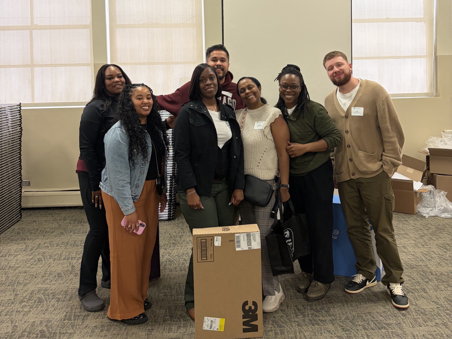 Rachelle Paul-Brutus, Executive Director of the Chicago Asthma Consortium, with Certified partner product donations at the 2026 Community Health Worker Educational Forum.