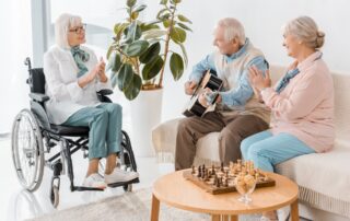 Older adults smiling together in a bright, comfortable senior living community